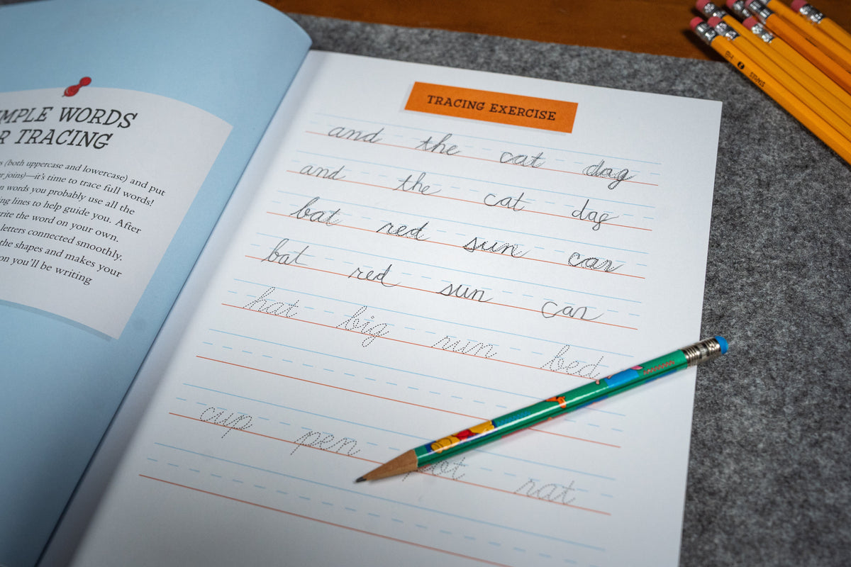 The Beginner's Cursive Handwriting Workbook: Learn to Write Cursive with Wacky Jokes & Puzzles